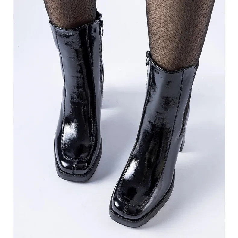 Black patent ankle boots by Boni